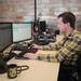 HookLogic client implementation specialist Josh Taylor works at his desk. Melanie Maxwell I AnnArbor.com